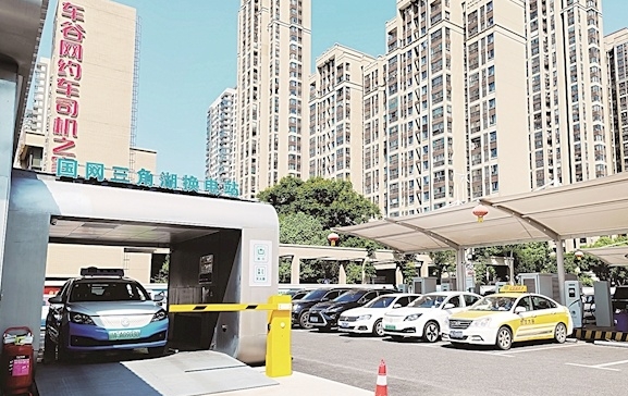 電動汽車3分鐘換好電池武漢打造便利“換電服務圈”